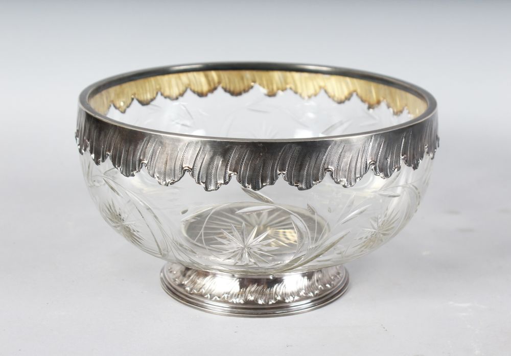 A GOOD CUT CRYSTAL FRUIT BOWL with silver rim and base. 8.5ins diameter.