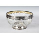 A GOOD CUT CRYSTAL FRUIT BOWL with silver rim and base. 8.5ins diameter.