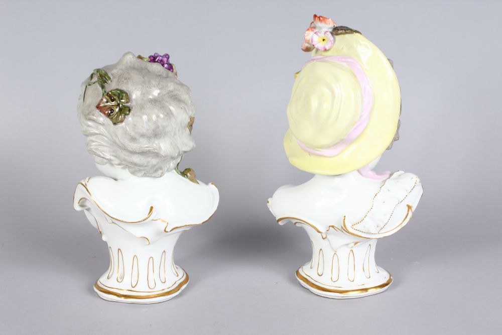 A GOOD PAIR OF 19TH CENTURY MEISSEN BUSTS OF CHILDREN, one with grapes in her hair, the other - Image 2 of 3