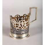 A RUSSIAN PIERCED AND NIELLO SILVER BEAKER HOLDER.