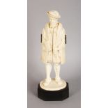 A VERY GOOD 19TH CENTURY CARVED IVORY FIGURE OF HENRY V, the body opens as a triptych, on a wooden