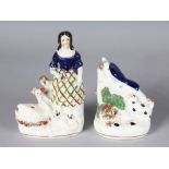 A STAFFORDSHIRE BLUE BIRD PEN HOLDER with dog, 4ins high, and A GIRL WITH A SWAN, 6ins high (2).