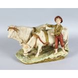 A GOOD PORCELAIN GROUP, COWBOY WITH COW AND BULL tethered together. Printed mark. 14ins long.