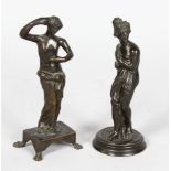 AFTER THE ANTIQUE A SMALL PAIR OF BRONZE FIGURES OF VENUS. Both 5ins high.