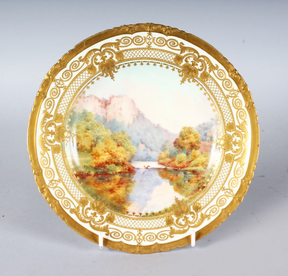 A ROYAL CROWN DERBY FINE PLATE painted and titled with a scene of High Tor, Matlock, Derbyshire,