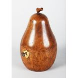 A WOODEN PEAR TEA CADDY. 7ins high.