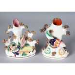 TWO STAFFORDSHIRE SPILL VASES with birds and encrusted foliage. 5ins high.