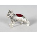 A SILVER NOVELTY DOG PIN CUSHION.