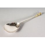 A JAMES I SEAL TOP SPOON, 7ins long. London 1606. Maker: CW. See Jacksons, Page 110, C entwining W.
