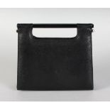 A BLACK SNAKESKIN BAG, Made in Italy.
