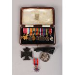 A GROUP OF TEN MINIATURE MEDALS in a Spink & Son case 1914, Iron Cross and St Johns Medal (12).