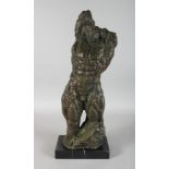 AN UNUSUAL ABSTRACT BRONZE OF A MAN. 24ins high.