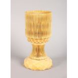 A GOOD EUROPEAN CARVED AND PIERCED GOBLET. 5ins high.