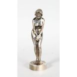 A GOOD 1920'S CHROME STANDING FEMALE CAR MASCOT on a circular base. 4.5ins high.