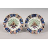 A PAIR OF POLYCHROME DUTCH DELFT PLATES, EARLY 18TH CENTURY, marked 'ADWS' in monogram (1725-