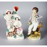 A STAFFORDSHIRE FIGURE OF A BOY with a bird and birds nest, 7.5ins, and A VASE GROUP, boy and girl