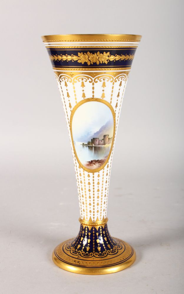 A GOOD SPODE COPELAND TAPERING VASE, rich blue and gilt decoration, painted with reverse panels of a