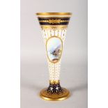 A GOOD SPODE COPELAND TAPERING VASE, rich blue and gilt decoration, painted with reverse panels of a
