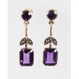 A PAIR OF 9CT GOLD AMETHYST DROP EARRINGS.