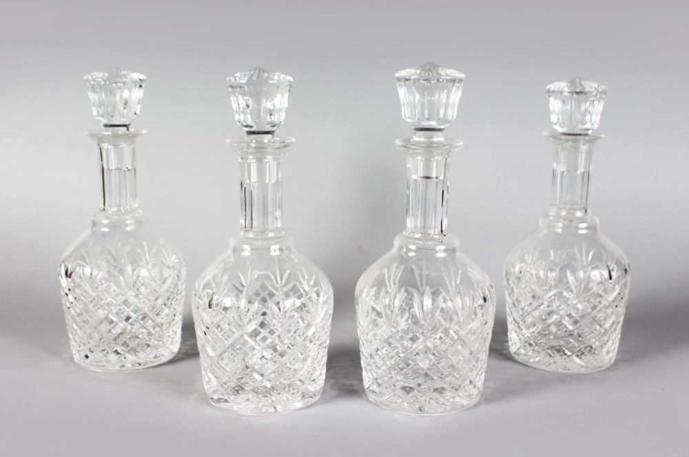 A GOOD SET OF FOUR STUART CUT MALLET DECANTERS AND STOPPERS.