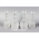 A GOOD SET OF FOUR STUART CUT MALLET DECANTERS AND STOPPERS.