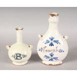 TWO 18TH CENTURY DELFT GUGLETS, "JOSEPH AND BOY". 8ins and 6ins high.