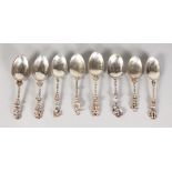 A SET OF EIGHT DUTCH SILVER SPOONS with classical figure handles.