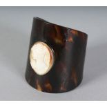 A TORTOISESHELL CAMEO SET BRACELET.