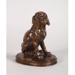 ALFRED JACQUEMART (1824-1896) FRENCH A GOOD SMALL SEATED DOG on an oval base. 3.75ins high.