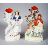 TWO STAFFORDSHIRE SPILL VASES, "RED RIDING HOOD", and GIRL WITH LAMB AND YOUNG (2). 10ins and 9.5ins