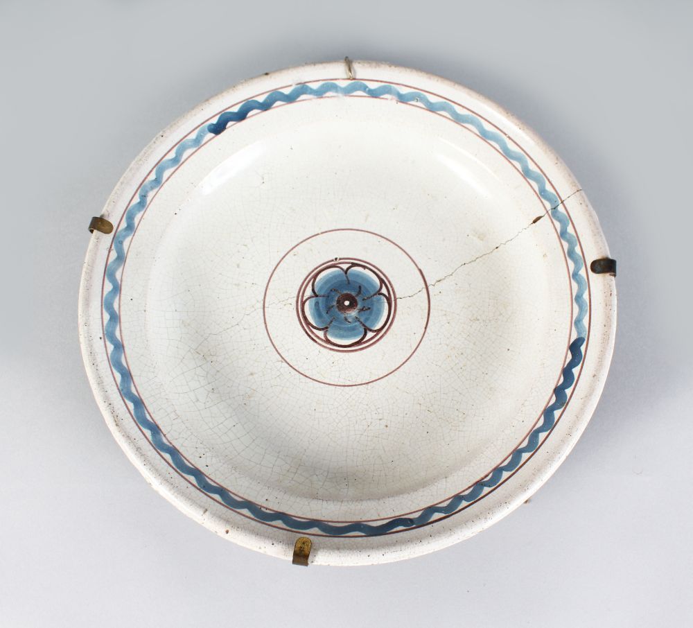 A TIN GLAZE CHARGER. 12ins diameter.