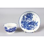 AN 18TH CENTURY WORCESTER TEA BOWL AND SAUCER printed in under-glaze blue with the European