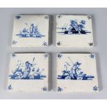 A SET OF FOUR DUTCH BLUE AND WHITE TILES, Circa. 1725, decorated with a church and figures. 5ins