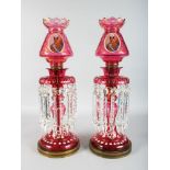 A SUPERB LARGE PAIR OF VICTORIAN BOHEMIAN RUBY GLASS LUSTRES, the domes gilded and painted with