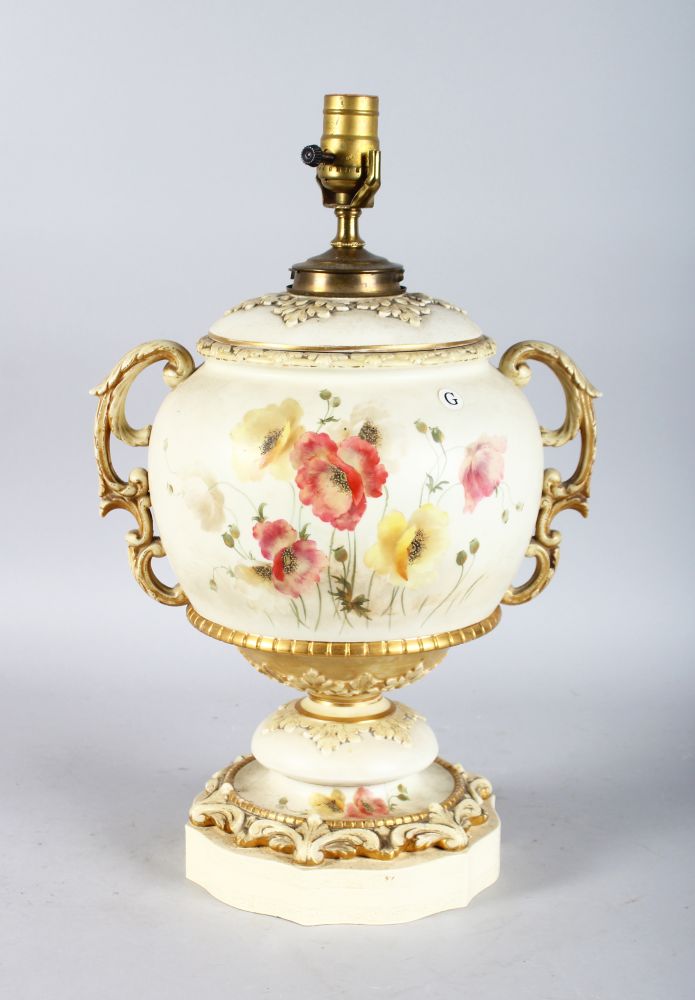 A LARGE WORCESTER PORCELAIN TWO HANDLED LAMP, painted with flowers.