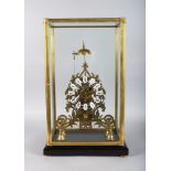 A GOOD CATHEDRAL SKELETON CLOCK in a glass case. 18ins high.