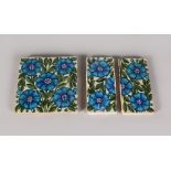 A DE MORGAN TILE, blue flowers and green leaves, 6ins square, and a matching tile in two halves.