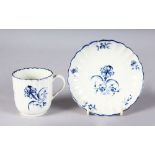 AN 18TH CENTURY WORCESTER COFFEE CUP AND SAUCER printed in under-glaze blue with the Gillyflower