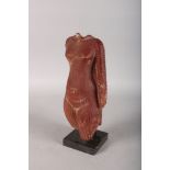 A CARVED STONE ANTIQUITY OF A LADY on a marble base. 12.5ins high.