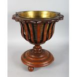 A DUTCH MAHOGANY BUCKET with brass liner.