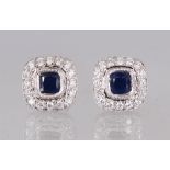 A PAIR OF 18CT WHITE GOLD, SAPPHIRE AND DIAMOND CLUSTER EARRINGS of 1.4CTS.