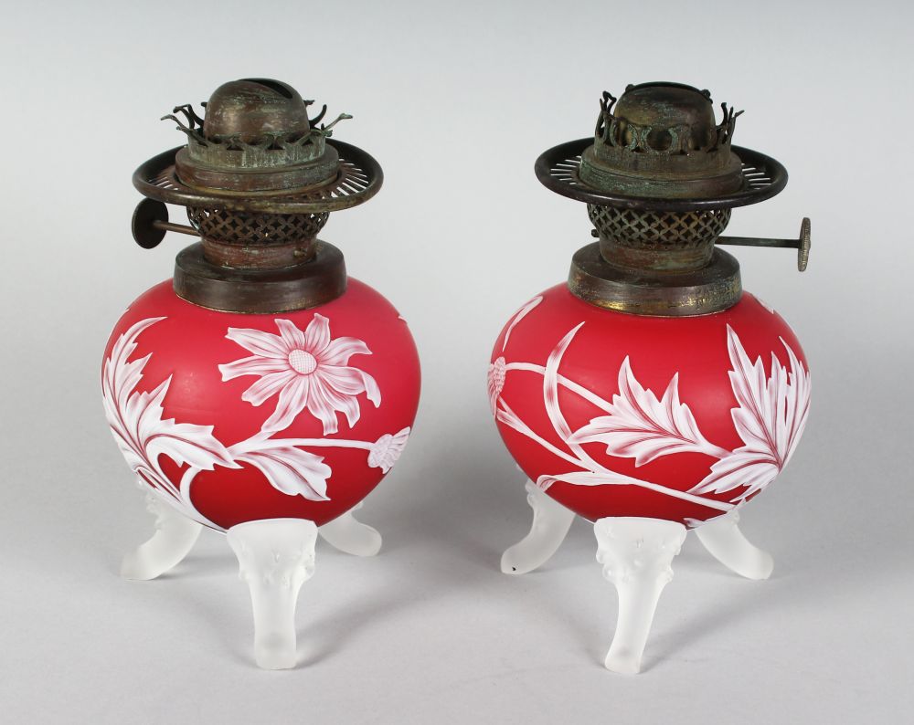 A SUPERB PAIR OF "WEBBS" STYLE RUBY CAMEO OIL LAMP BASES with flowers, thistles and leaves, each