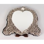 A VICTORIAN HEART SHAPED EASEL MIRROR. 18ins high.