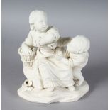 AN 18TH CENTURY SEVRES BISCUIT PORCELAIN FIGURE GROUP OF TWO CHILDREN, the young girl watching a