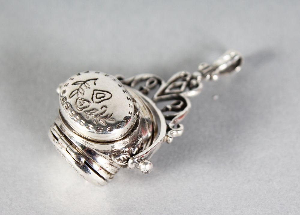 A .925 SILVER NOVELTY FOB-SEAL LOCKET.