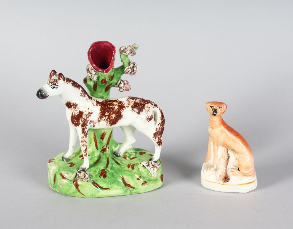 A STAFFORSHIRE HORSE VASE GROUP, 6ins high, and A WHIPPET, 4ins high.