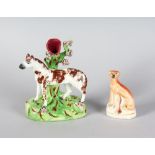 A STAFFORSHIRE HORSE VASE GROUP, 6ins high, and A WHIPPET, 4ins high.