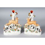 A PAIR OF STAFFORDSHIRE SPILL VASE FIGURES OF STAGS being chased by dogs. A similar pair illustrated