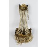 A 20TH CENTURY ORMOLU CUT GLASS CHANDELIER, the upper and lower bands cast with vine leaves and