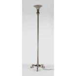 A 20TH CENTURY CAST PEWTER UPLIGHTER, with a reeded column on three curving legs. 5ft 8ins high.